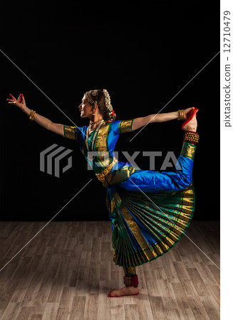 Beautiful girl dancer of Indian classical dance Bharatanatyam 12710479
