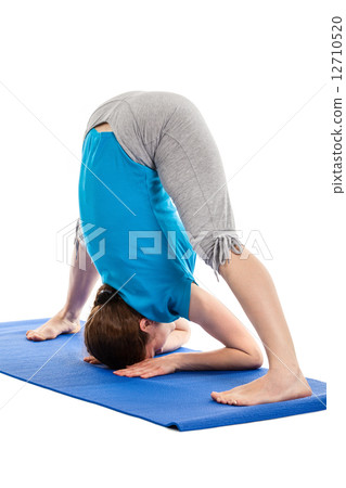 Yoga - young beautiful woman doing yoga asana excerise isolated Yoga - young beautiful woman doing yoga asana excerise isolated 12710520