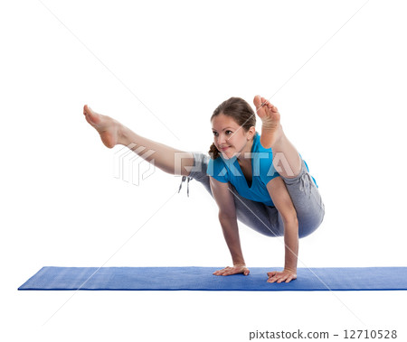 Yoga - young beautiful woman doing yoga asana excerise isolated 12710528