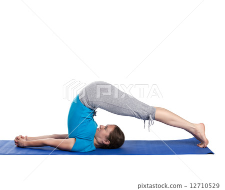 Yoga - young beautiful woman doing yoga asana excerise isolated 12710529
