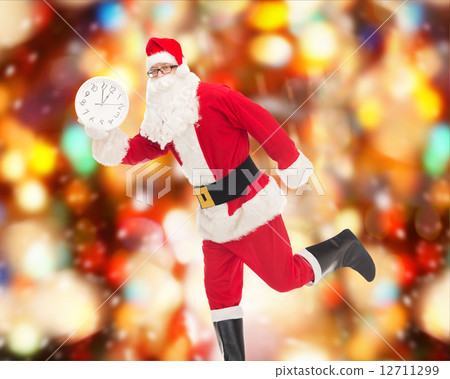 man in costume of santa claus with clock 12711299