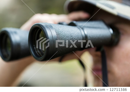 close up of soldier or hunter with binocular close up of soldier or hunter with binocular 12711386