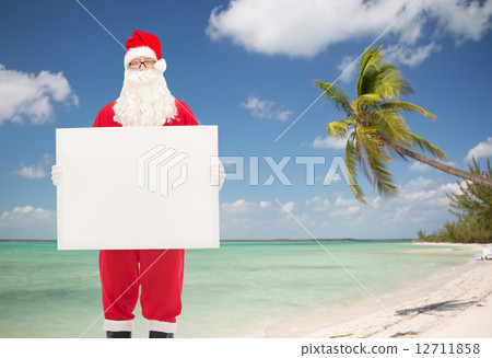 man in costume of santa claus with billboard man in costume of santa claus with billboard 12711858