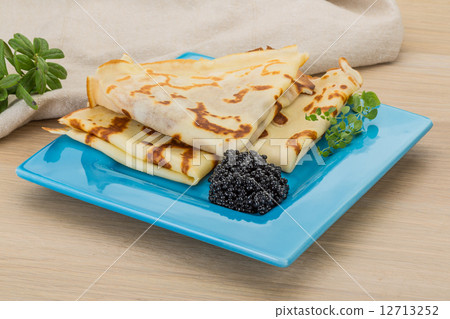 Pancakes with black caviar Pancakes with black caviar 12713252
