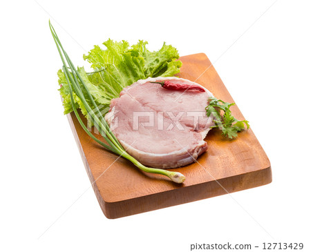Raw pork steak 12713429