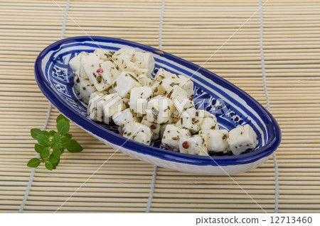 Cheese with spices and oil Cheese with spices and oil 12713460