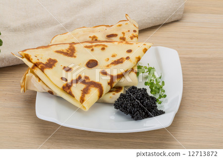 Pancakes with black caviar Pancakes with black caviar 12713872