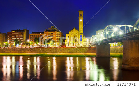 Evening view of  Ebro  and church in Tortosa 12714071