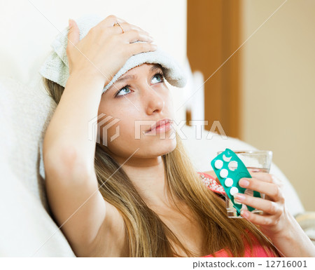 Woman with headache take medicine Woman with headache take medicine 12716001