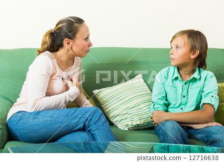 teenager son and mother having serious talking 12716638