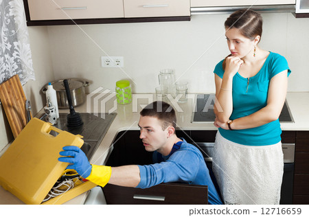 plumber repairing water lines 12716659