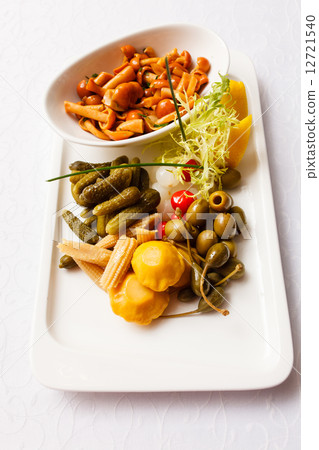 Set on a plate of pickles 12721540
