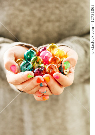 Christmas balls in the hands Christmas balls in the hands 12721862