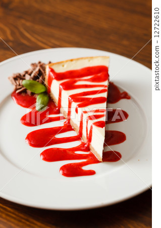 cheesecake with strawberry sauce 12722610