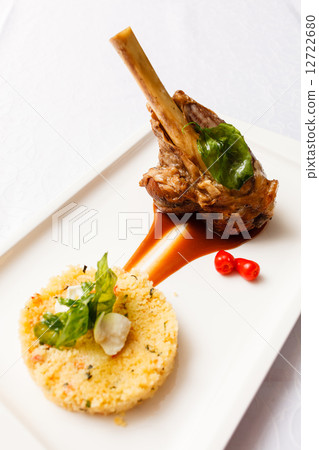 Veal chop with rice Veal chop with rice 12722680