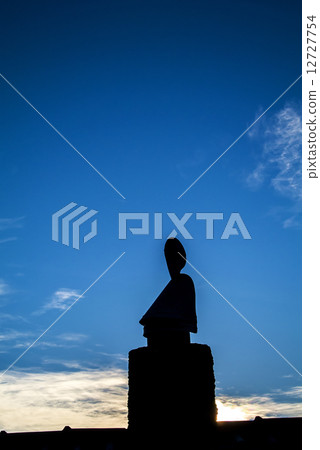 Buddha on a roof Buddha on a roof 12727754