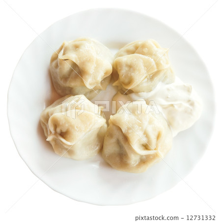 top view of manti dumpling on white plate isolated 12731332