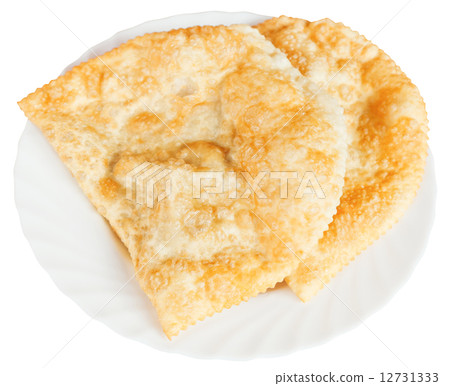 cheburek pastry on white plate isolated 12731333