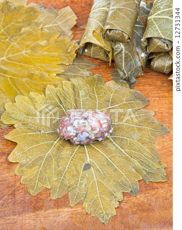 cooking of dolma from grape leaves, mince, rice cooking of dolma from grape leaves, mince, rice 12731344