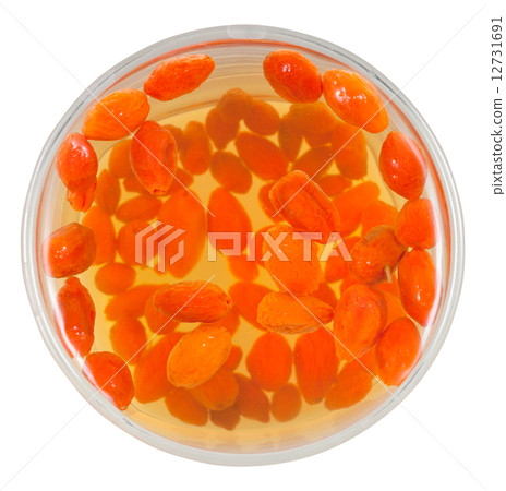 top view of glass with goji berries infusion 12731691