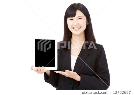 Business woman to show and show tablet 12732697