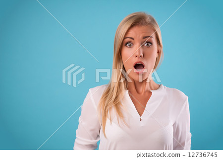 Lovely blonde wearing white blouse 12736745