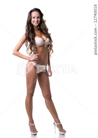 Gorgeous tanned model posing in lingerie 12740019