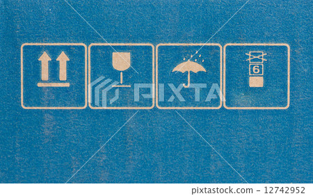 Fine image close-up of fragile symbol on cardboard. 12742952
