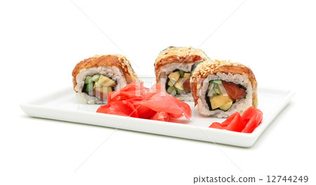 Japanese rolls and pickled ginger on a plate. white background. Japanese rolls and pickled ginger on a plate. white background. 12744249