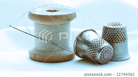 Thread bobbins and sewing thimbles 12744562