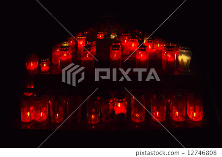 Many lighted candles 12746808