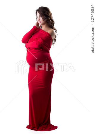 Beautiful expectant mother posing in elegant dress 12746884