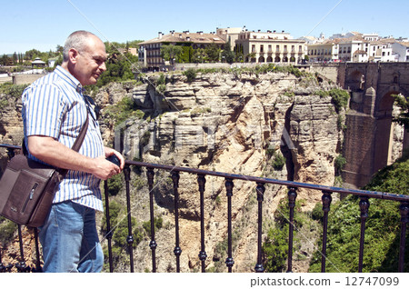tourist on a background rocks in Ronda, Spain 12747099
