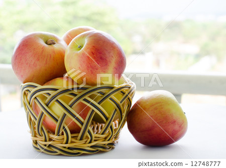 apples with basket 12748777