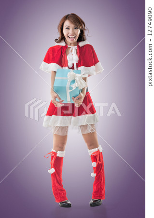 Christmas girl hold gift box Christmas girl hold gift box 12749090