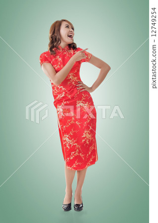 Chinese woman introducing 12749254