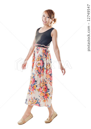Attractive Asian woman with maxi dresses Attractive Asian woman with maxi dresses 12749547