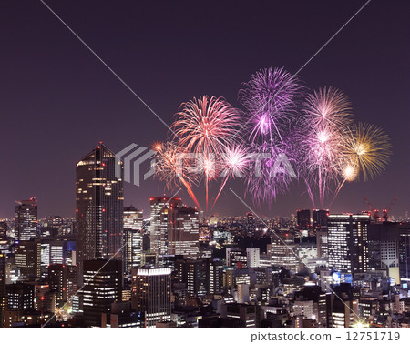 Fireworks celebrating over Tokyo cityscape at night 12751719