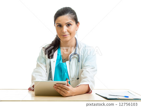 Doctor using a digital tablet isolated on white Doctor using a digital tablet isolated on white 12756103