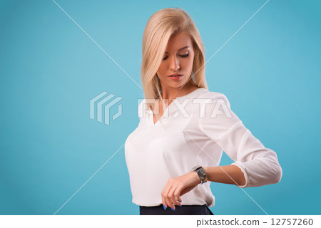 Lovely blonde wearing white blouse Lovely blonde wearing white blouse 12757260