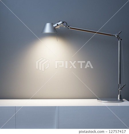 Metal Lamp On The White Desk In Black Wall Interior Room Metal Lamp On The White Desk In Black Wall Interior Room 12757417