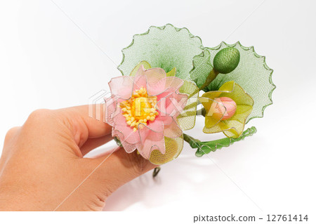 Plastic flower isolated on white background Plastic flower isolated on white background 12761414
