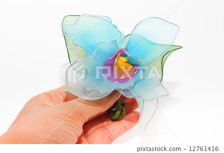 Plastic flower isolated on white background Plastic flower isolated on white background 12761416