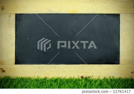 Blank Chalkboard on Lawn. Blank Chalkboard on Lawn. 12761417