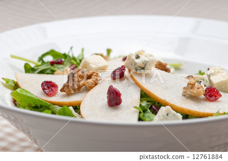 Fresh pears arugula gorgonzola cheese salad Fresh pears arugula gorgonzola cheese salad 12761884