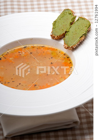 Italian minestrone soup with pesto crostini on side Italian minestrone soup with pesto crostini on side 12761994