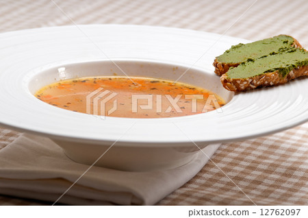 Italian minestrone soup with pesto crostini on side 12762097