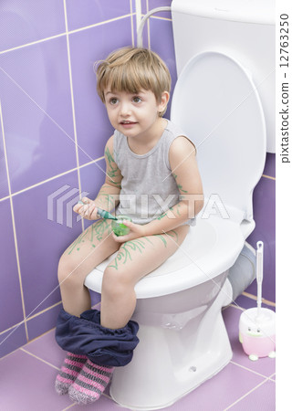 Baby on the Toilet Baby on the Toilet 12763250