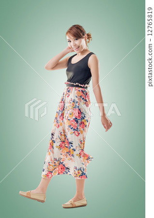 Attractive Asian woman with maxi dresses 12765819