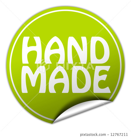 hand made round green sticker on white background 12767211